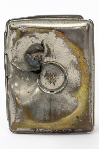 Cigarette Case with Damage from a Bullet