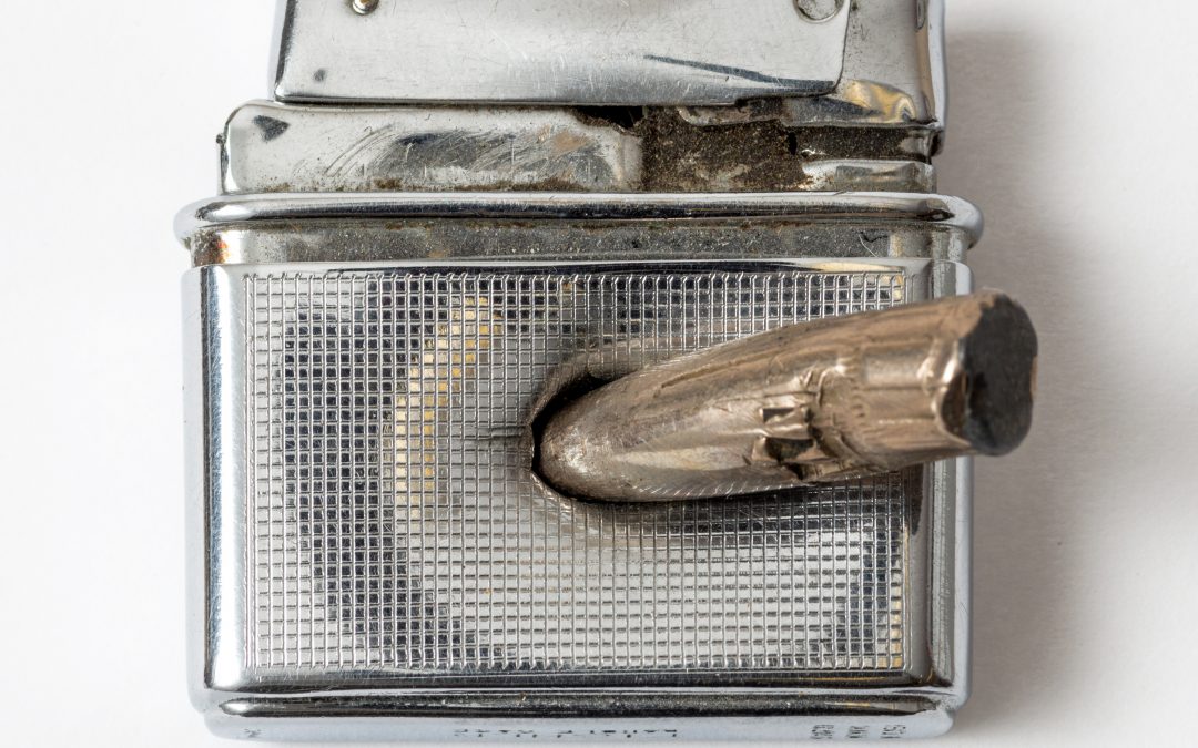 Cigarette Lighter Pierced by a Bullet